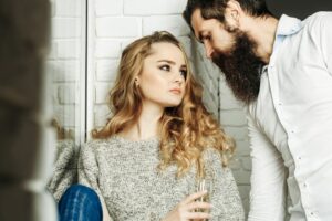 Couple arguing before breakup over addiction issues